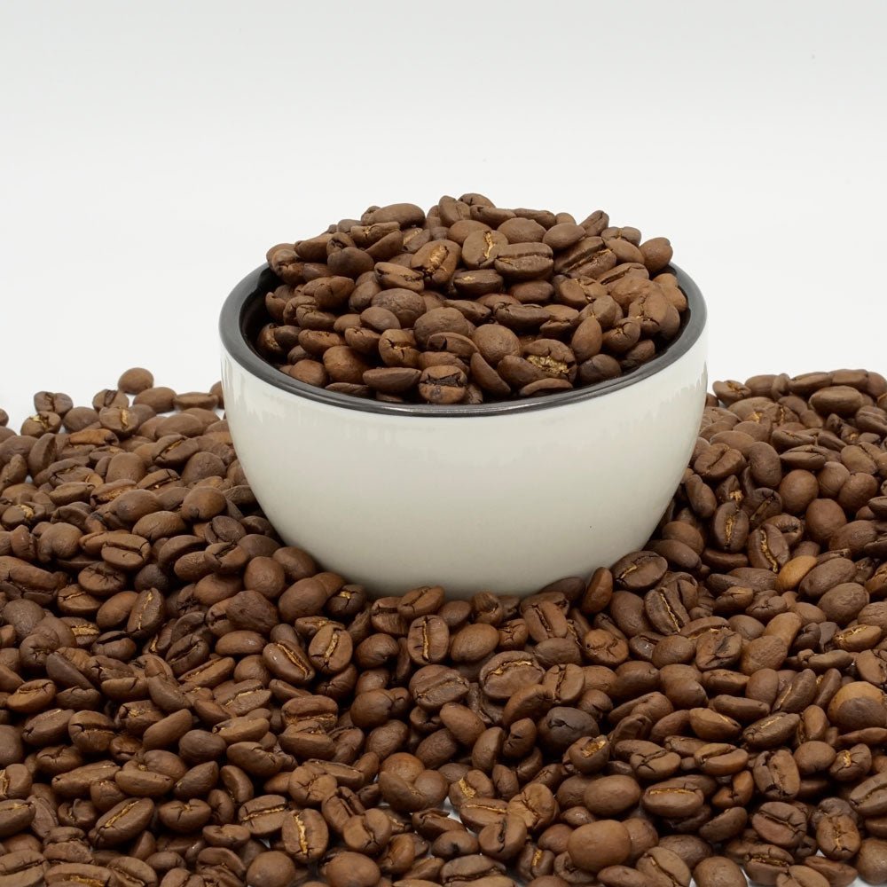 Black coffee bag with a label describing the product and nutritional information.