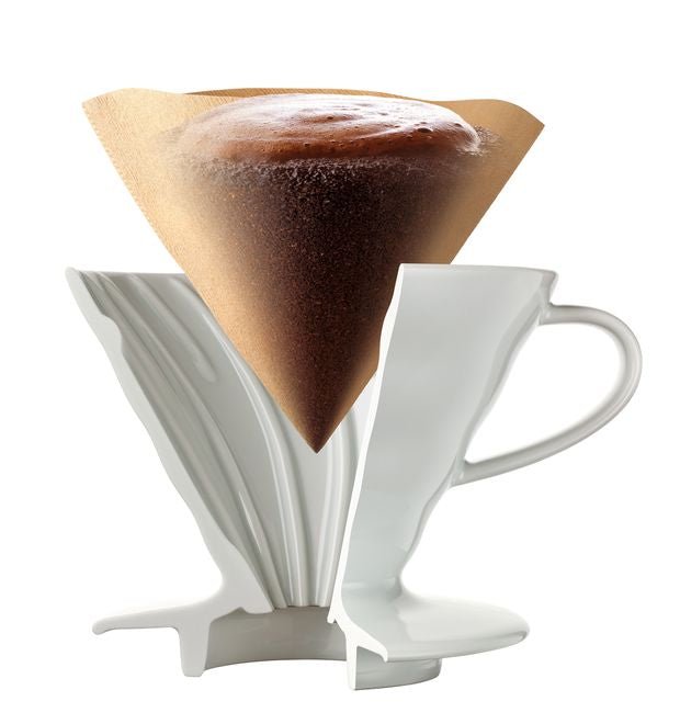 A creative coffee dripper designed to resemble a broken cup.